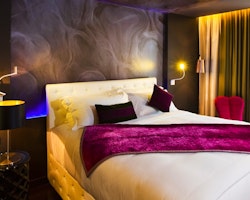 Deluxe bedroom at Hotel De L’Opera