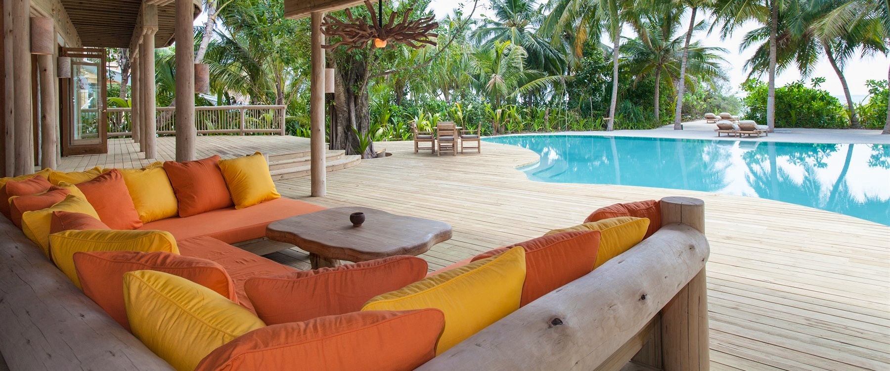 Daybed next to the pool in Villa 14 at Soneva Fushi, Maldives, Indian Ocean 