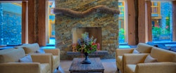 Lobby Fireplace At Moose Hotel & Suites