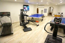 gym  and entertainment room at martello house barbados 
