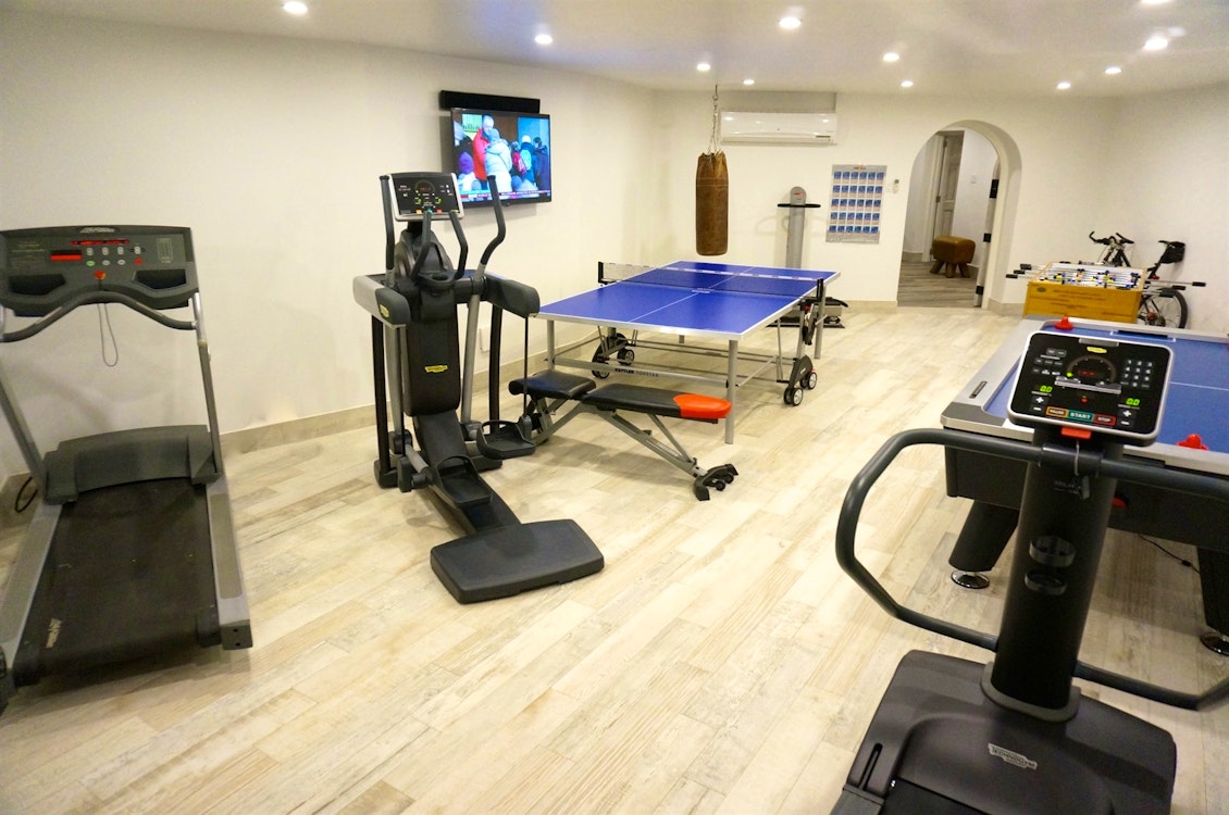 gym  and entertainment room at martello house barbados 