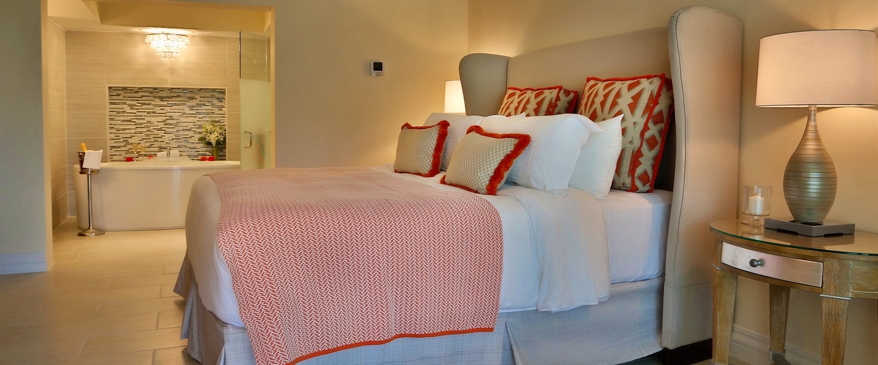 Bedroom and bathroom in Verandah Suite at Rendezvous, St Lucia 