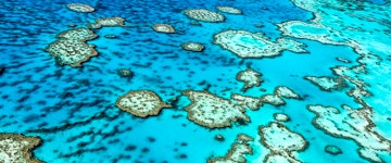 Helicopter flight and landing at Great Barrier Reef