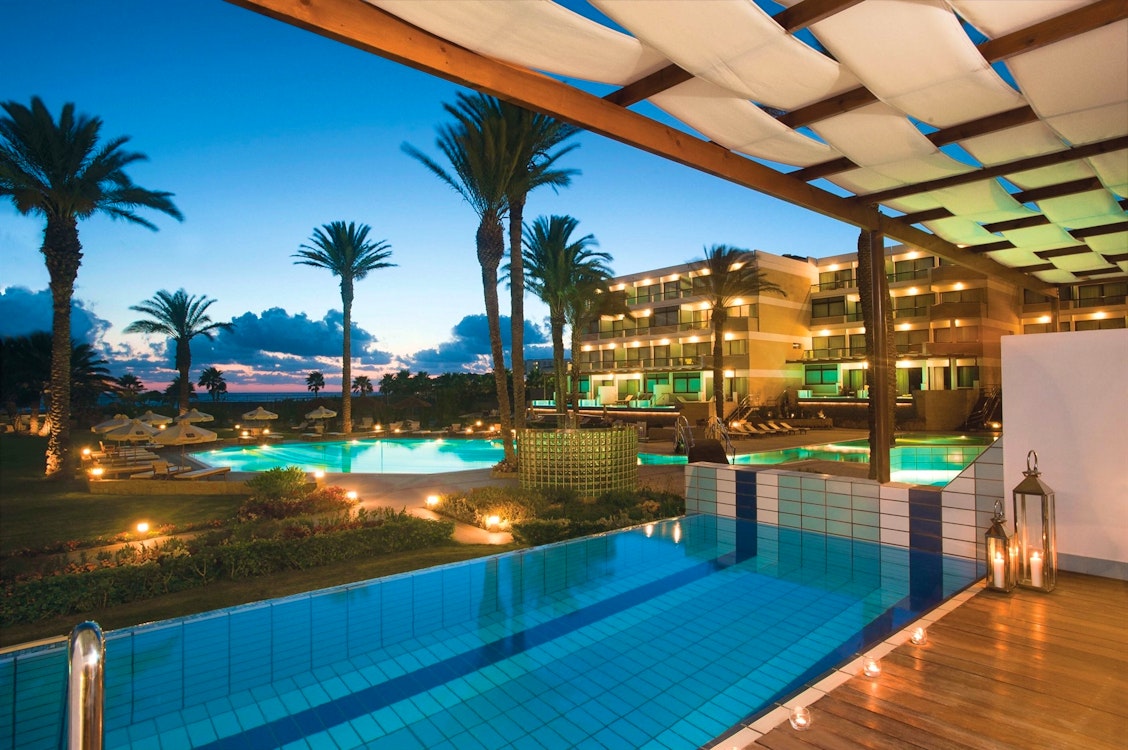 Pool in the evening, Constantinou Bros Asimina Suites Hotel, Almyra, Cyprus