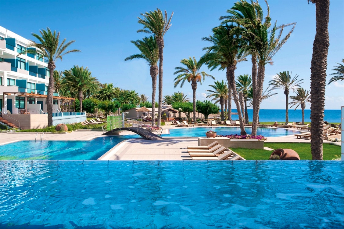 Swimming pool area at Constantinou Bros Asimina Suites Hotel, Almyra, Cyprus
