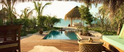 Beach villa decked pool at Azura Benguerra, Mozambique
