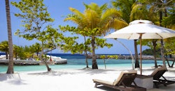 Relax along the beach at GoldenEye, Jamaica