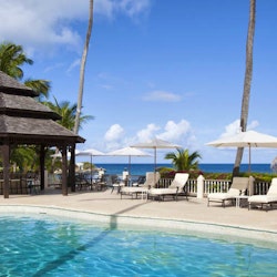 Relax by the pool at Blue Waters, Antigua