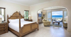 Spacious bedroom leading to private terrace at Rock Cottage at Blue Waters, Antigua