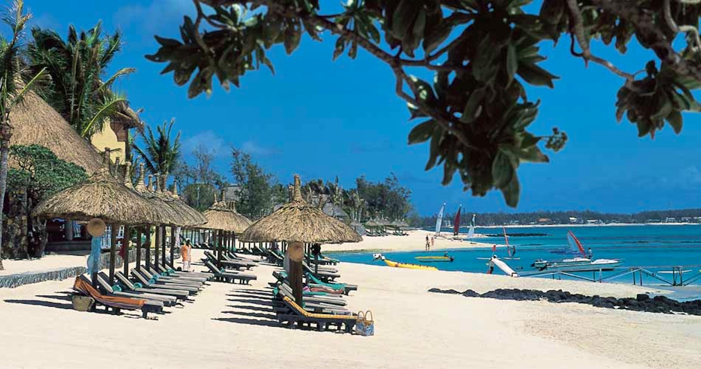 Lounge Chairs on Beach at Constance Belle Mare Plage - The Villas