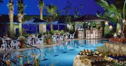 Swimming pool in the evening at Four Seasons Hotel Singapore