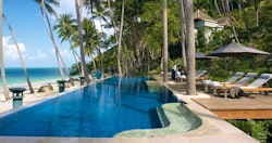 Relax poolside at Four Seasons Resort Koh Samui, Thailand
