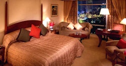 Bedroom with view at Mandarin Oriental Kuala Lumpur