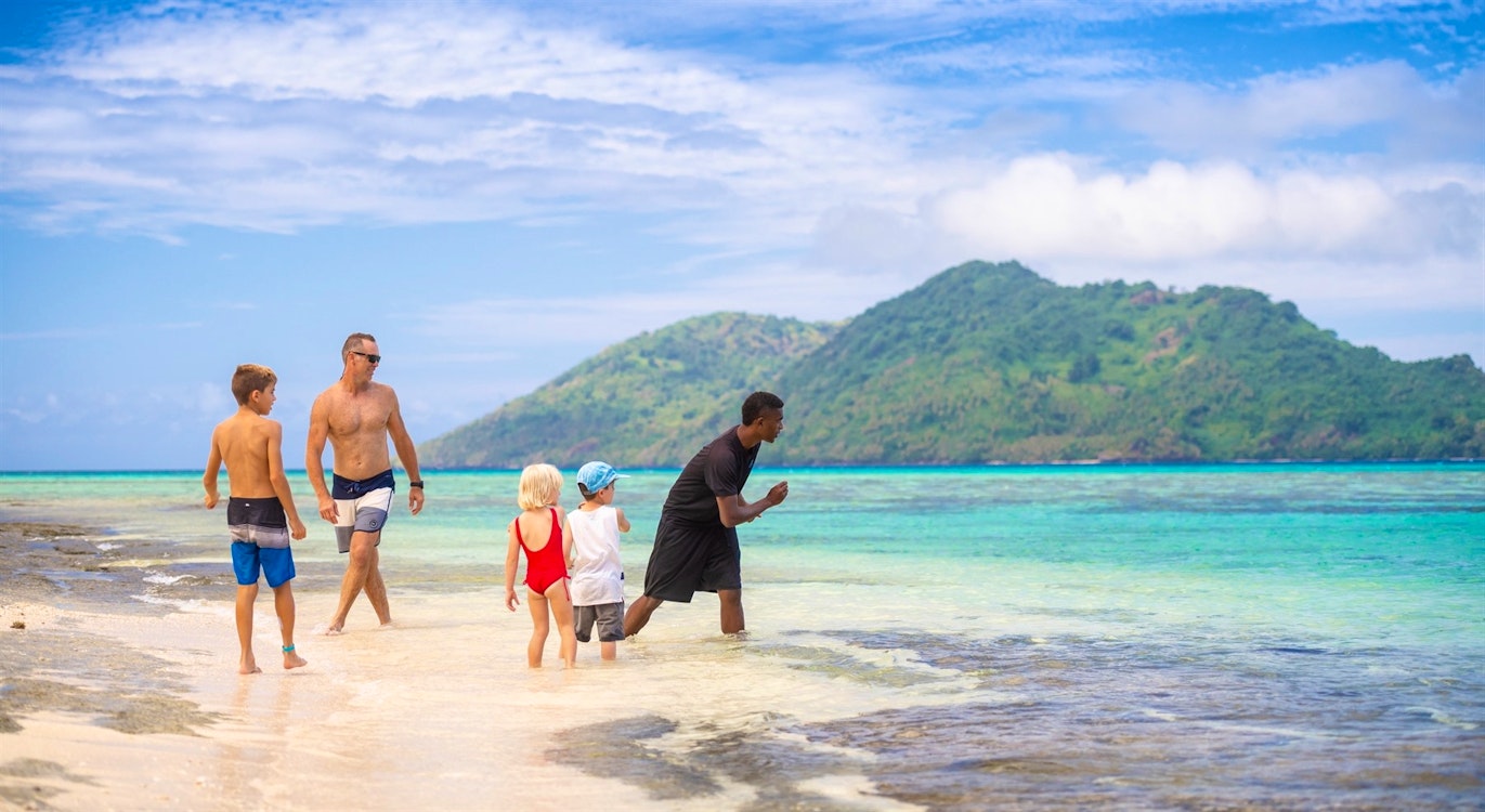 family with buddy at nanuku resort fiji