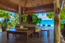 beach villa terrace at denis private island seychelles