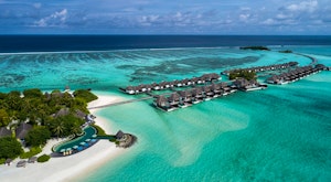 Enjoy views of the crystal clear waters at this spectacular resort in the Maldives<place>Four Seasons Resort Maldives at Kuda Huraa</place><fomo>292</fomo>