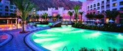 Hotel Pool at Night at Shangri La Barr Al Jissah Resort and Spa