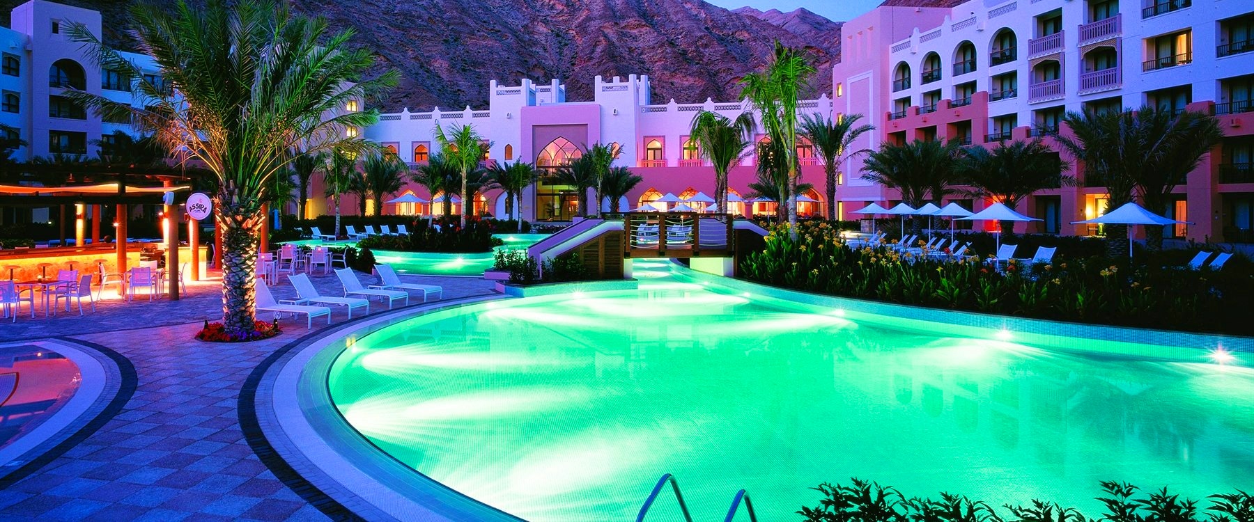 Hotel Pool at Night at Shangri La Barr Al Jissah Resort and Spa