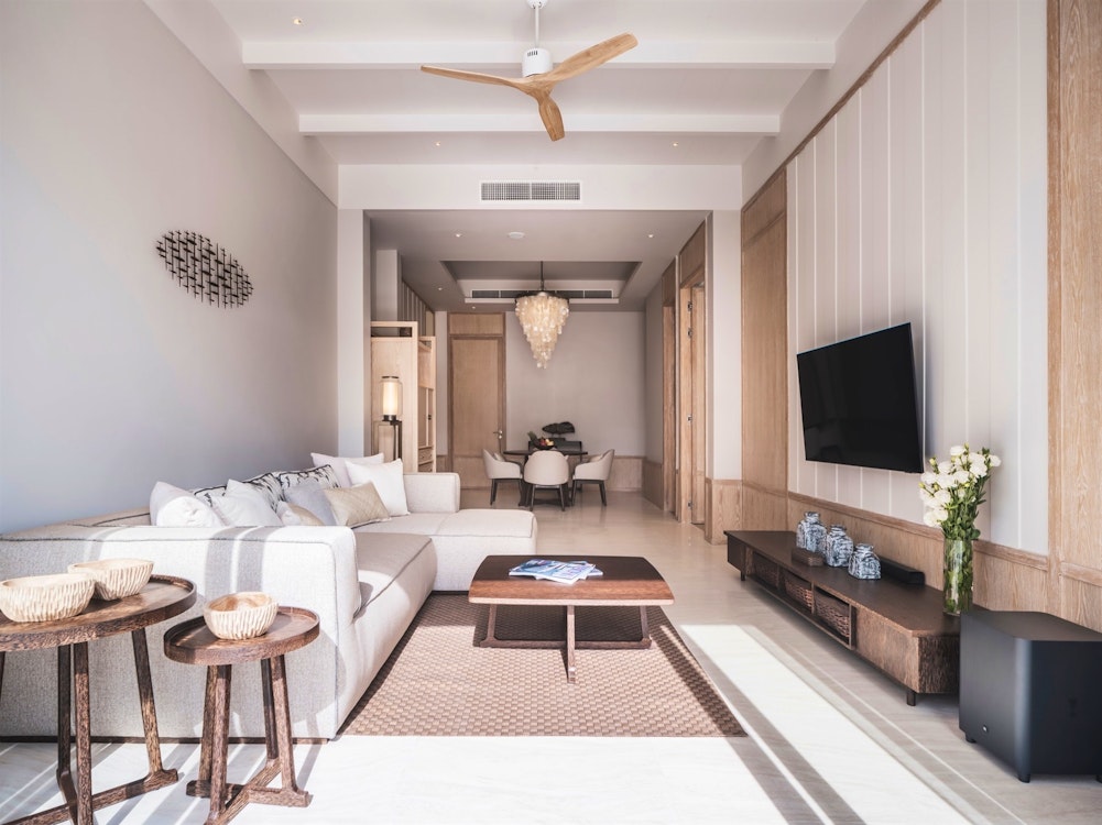 Beachfront pool villa living and dining area at Anantara Koh Yao Yai Resort and Villas