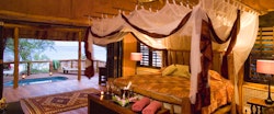 Bedroom interior at &Beyond Benguerra Island Lodge