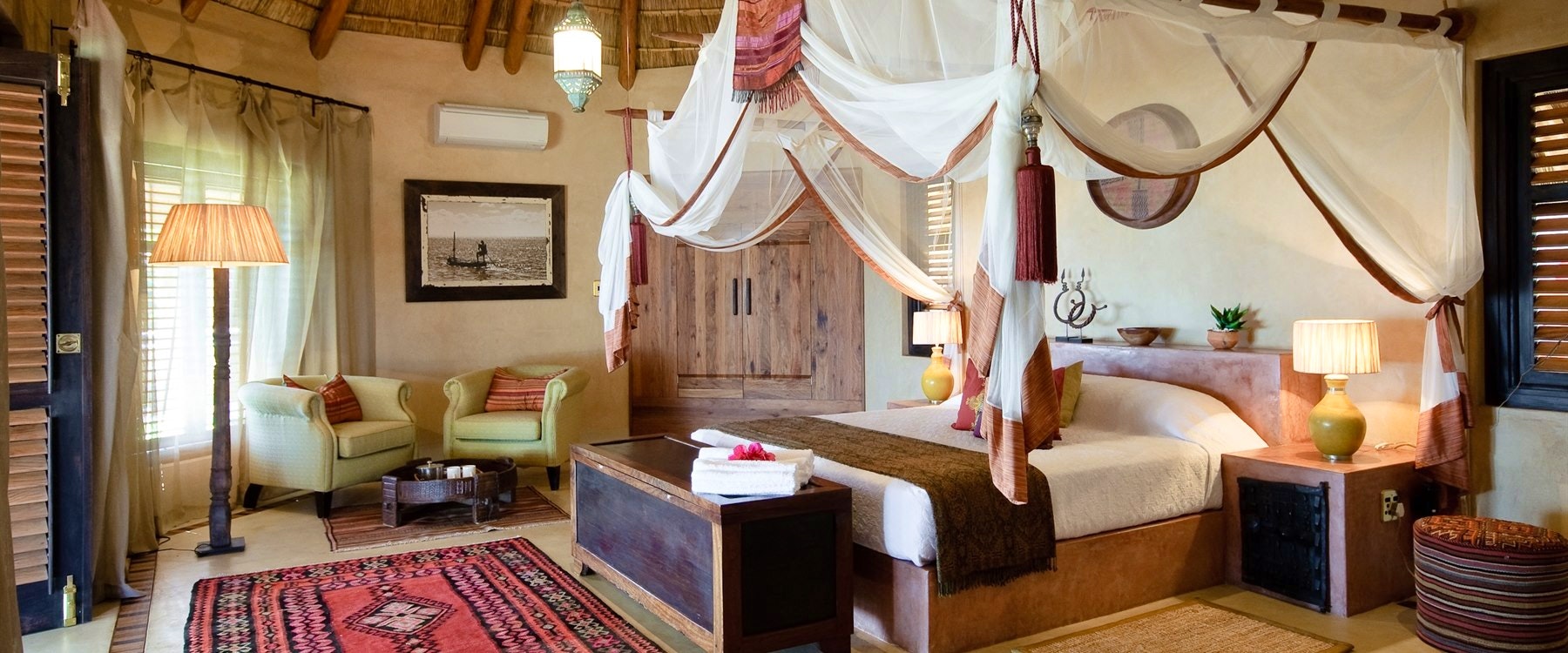 Villa bedroom at &Beyond Benguerra Island Lodge