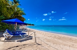 beach lounge chairs at bluff house barbados