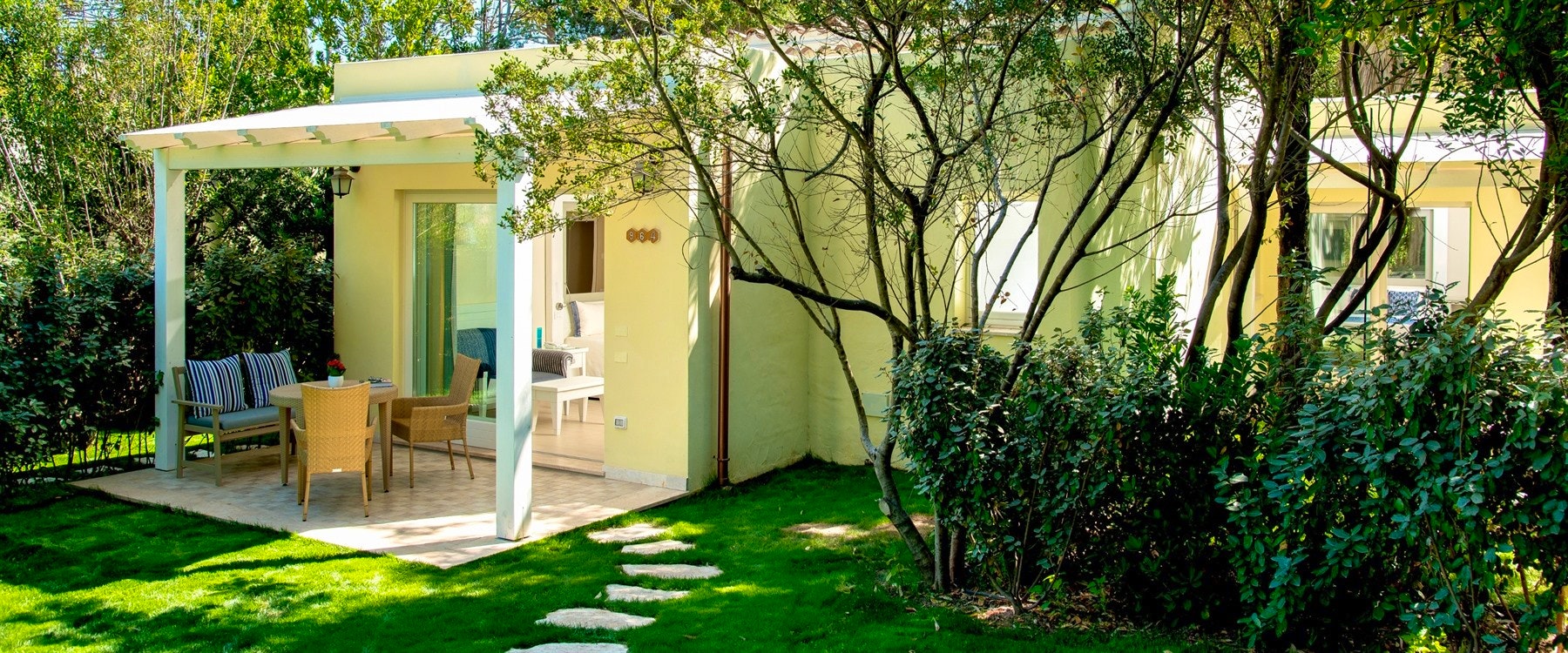 Deluxe Bungalow Exterior at Forte Village Hotel Bouganville, South Sardinia, Italy