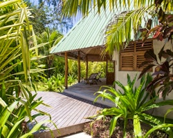 cottage exterior at denis private island seychelles