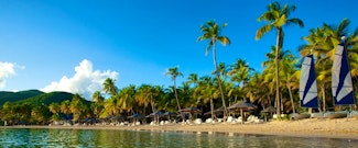 Spend your summer in this all-inclusive resort set on a bluff overlooking two beautiful beaches