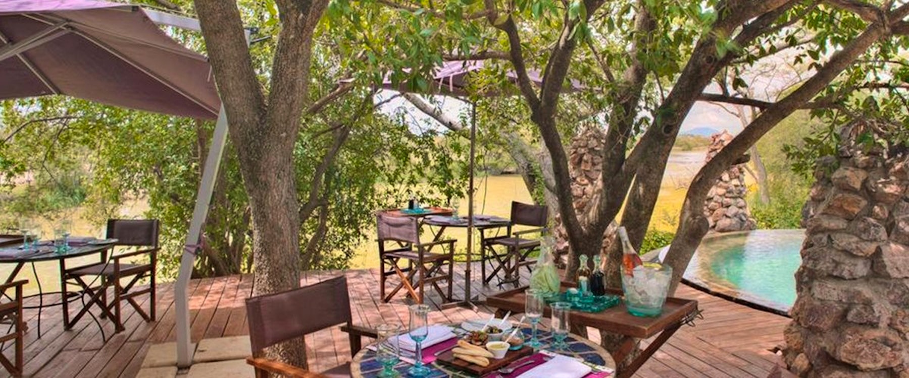 Outdoor dining area at &Beyond Grumeti Serengeti Tented Camp