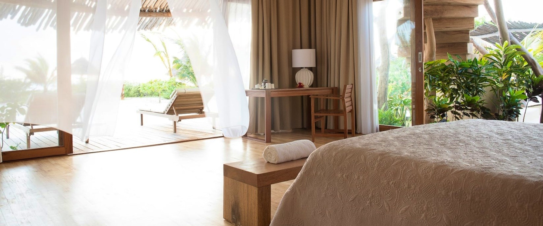 Bedroom overlooking the ocean at Zanzibar White Sand Luxury Villas and Spa