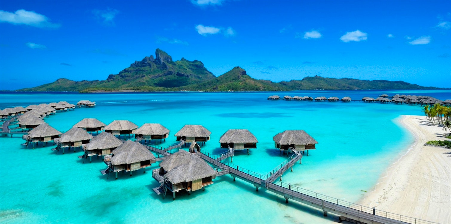 aerial view of overtwater bungalow suites at four seasons resort bora bora