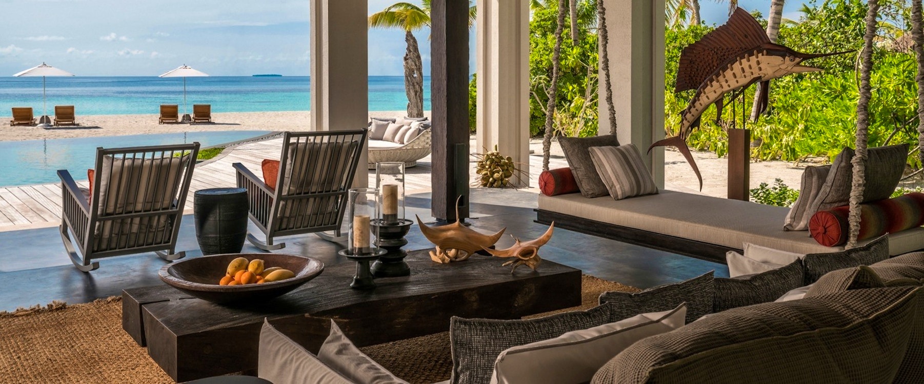 Beach House Living Room at Four Seasons Private Island Maldives at Voavah