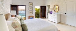 Sea view bedroom at Tennis courts at Guana Island, British Virgin Islands