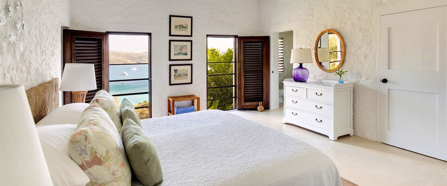 Sea view bedroom at Tennis courts at Guana Island, British Virgin Islands