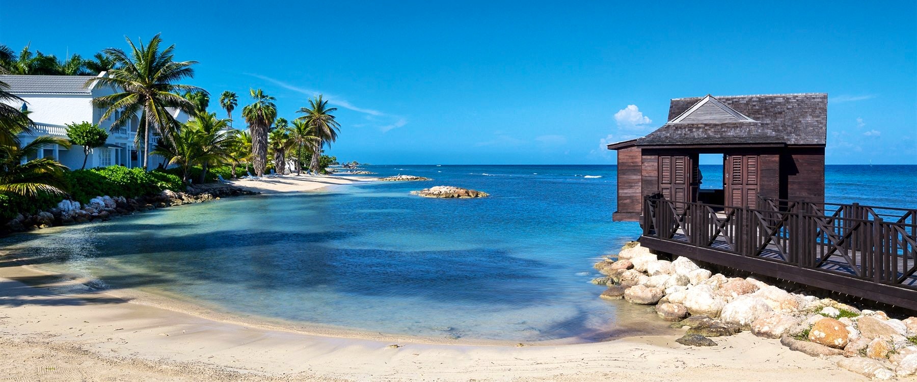 Take a stroll along the stunning shoreline at Royal Villas at Half Moon