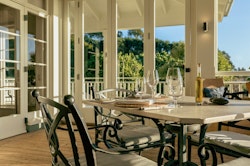main lodge green room balcony at rosewood kauri cliffs bay of islands new zealand