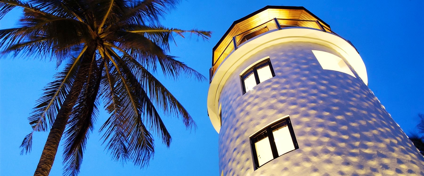 Lighthouse at night at The Racha