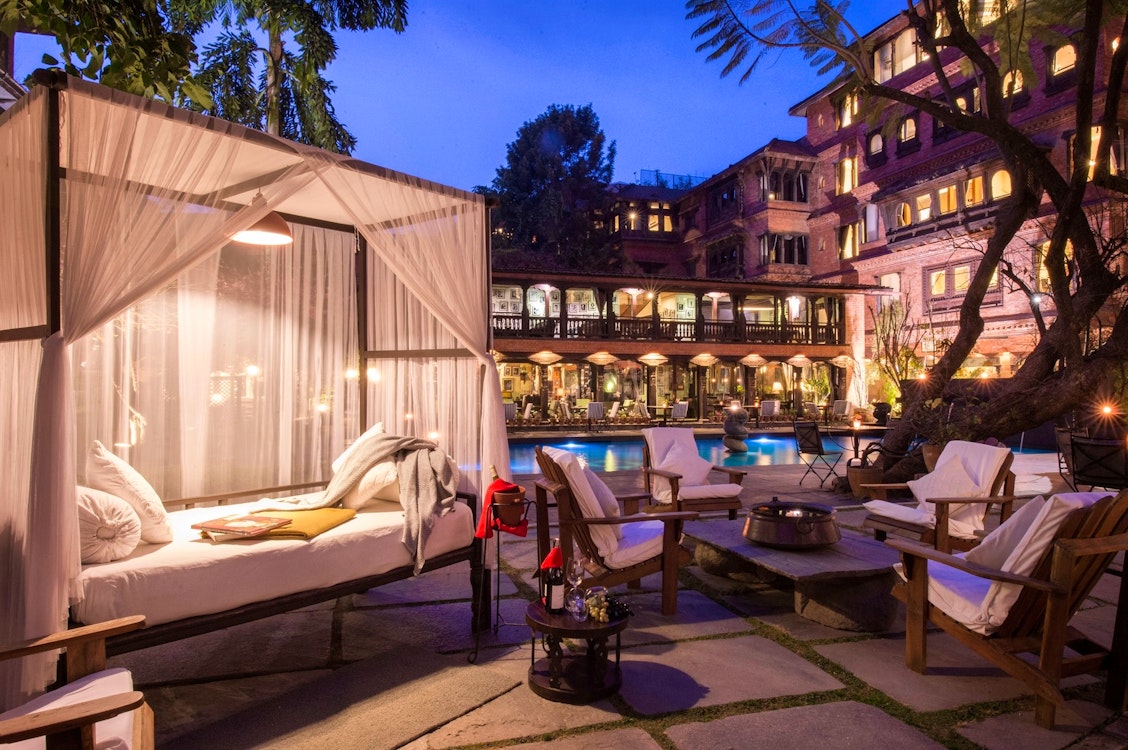 dining by the pool at dwarikas hotel