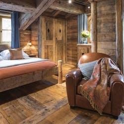 Bedroom with Chair at Chalet Montana