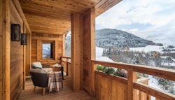 Room balcony overlooking the French Alps at Four Seasons Hotel Megève, France