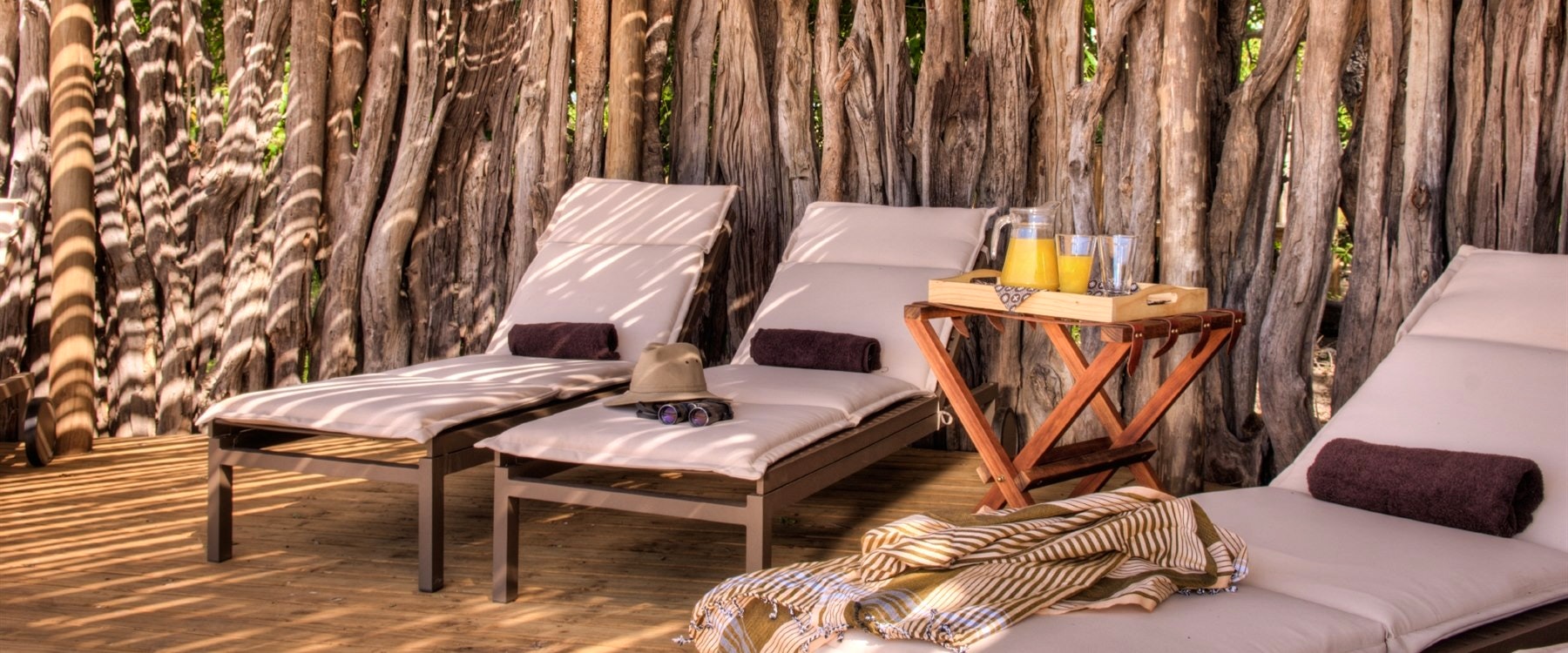 Deck chairs at Okuti Camp