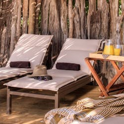 Deck chairs at Okuti Camp