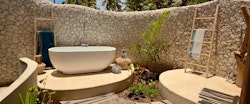 Oudoor bathroom at Zanzibar White Sand Luxury Villas and Spa