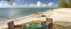Picnic on the beach at &Beyond Benguerra Island Lodge