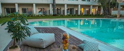 Pool Bar Seating Area at Domes Miramare, A Luxury Collection Resort, Corfu, Cyprus