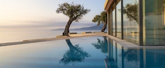 Escape to this luxury adult-only hotel on the seafront in Corfu