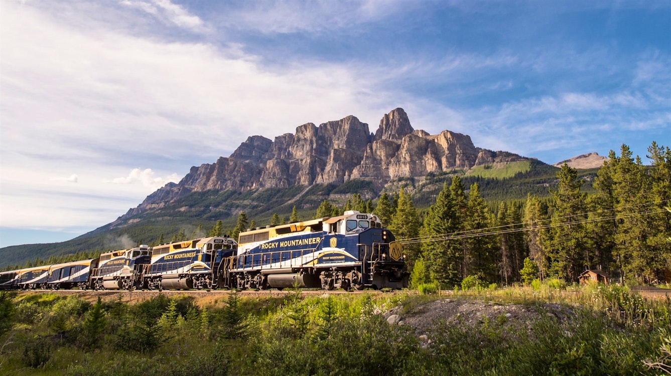rocky mountaineer passing castle mountain