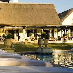 Pool area at The Royal Livingstone by Anantara
