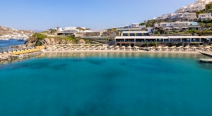 Enjoy this chic and exclusive resort located on a private stretch of sandy beach in Mykonos<place>Santa Marina, A Luxury Collection Resort</place><fomo>4</fomo>